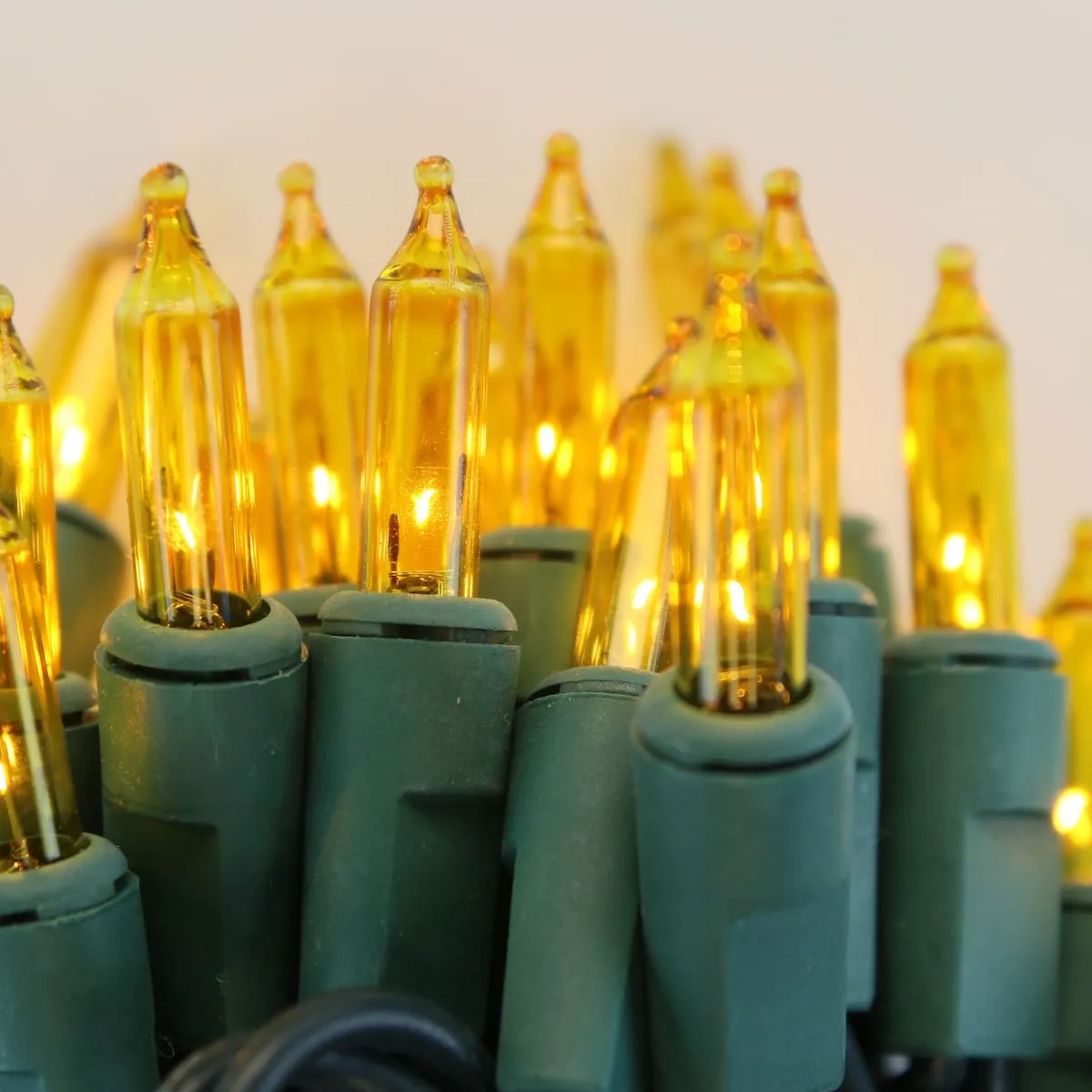 100-bulb Yellow Mini Lights, 2.5" Spacing, Green Wire