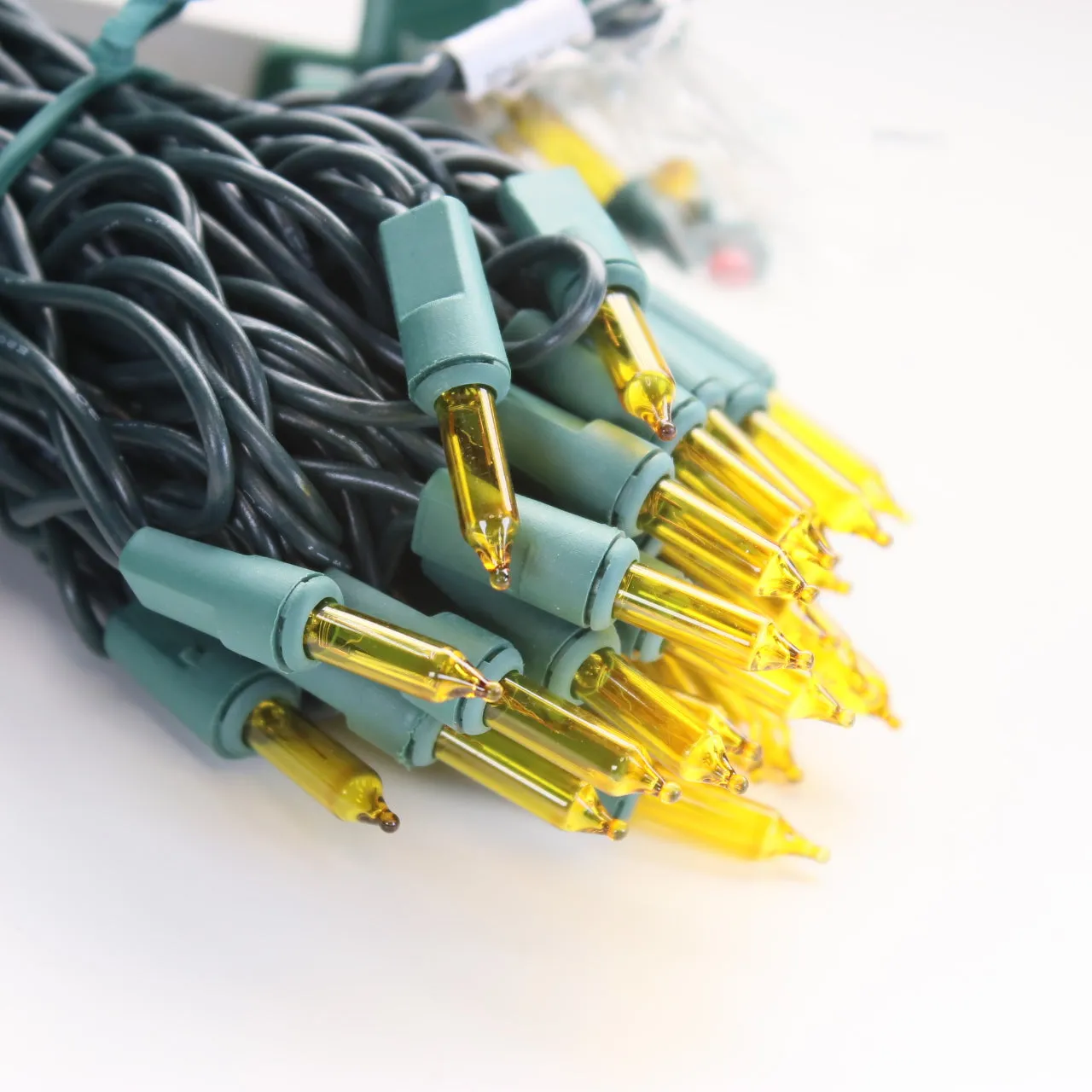 100-bulb Yellow Mini Lights, 2.5" Spacing, Green Wire