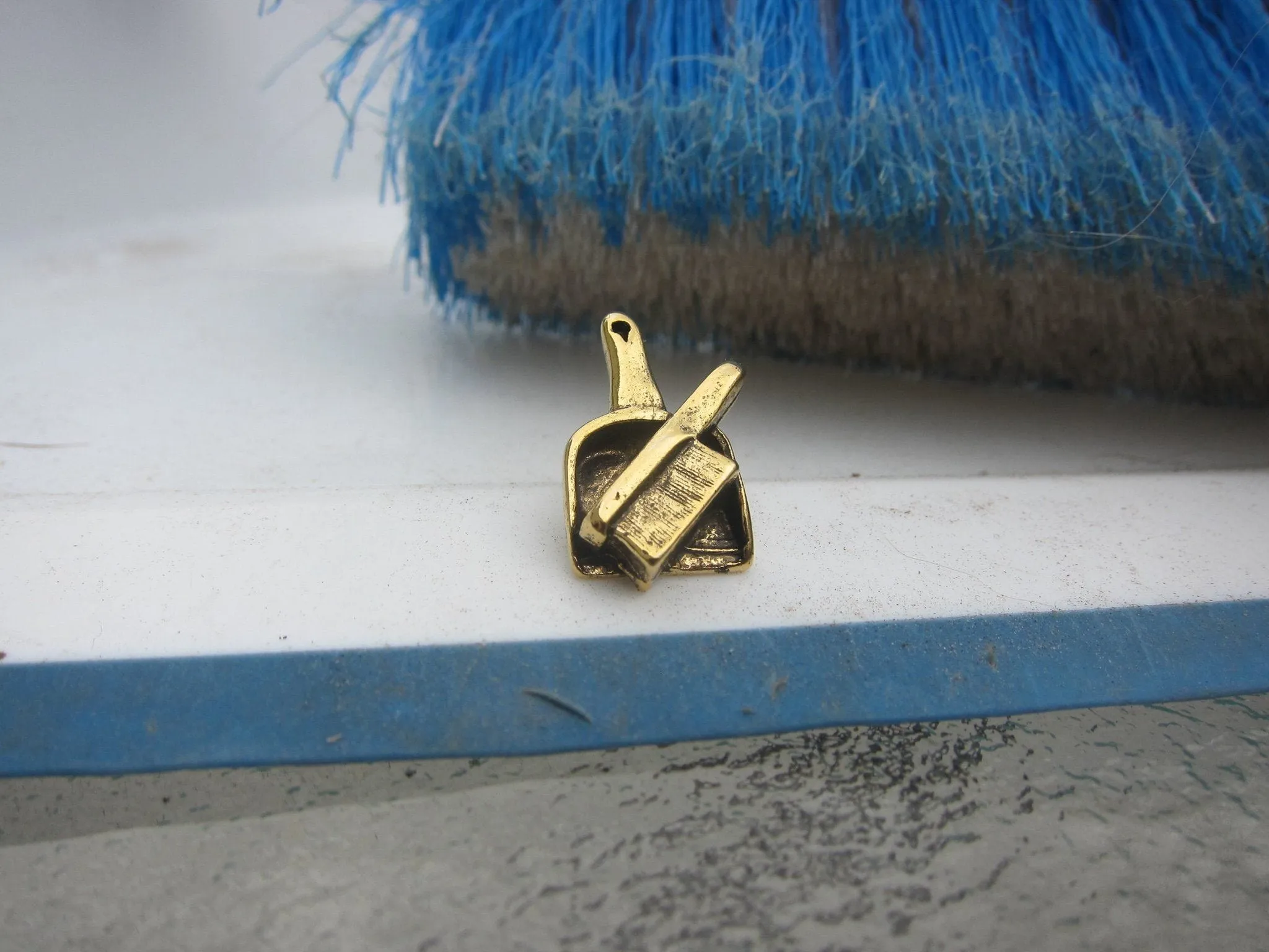 Dust Pan Gold Lapel Pin