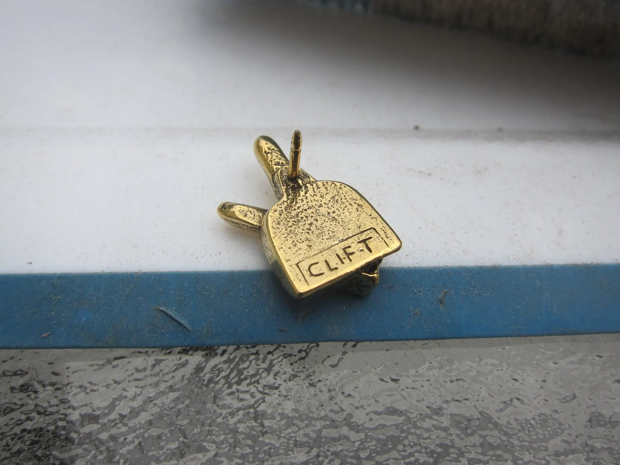 Dust Pan Gold Lapel Pin