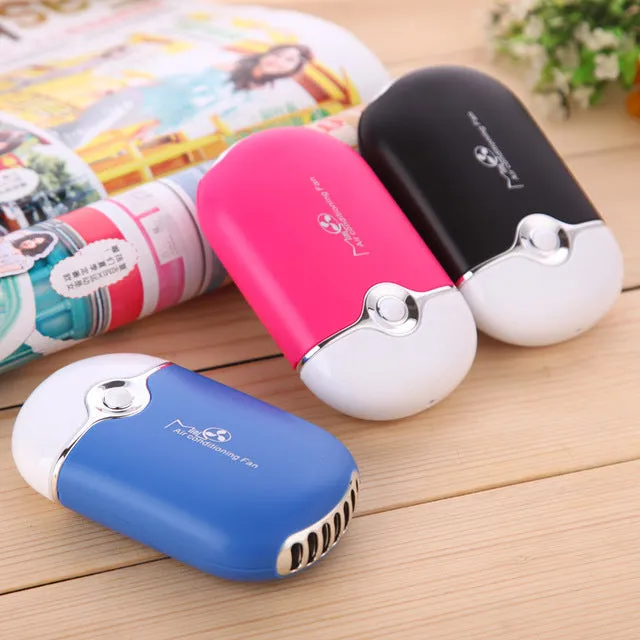 Portable mini handheld ac cooling fan